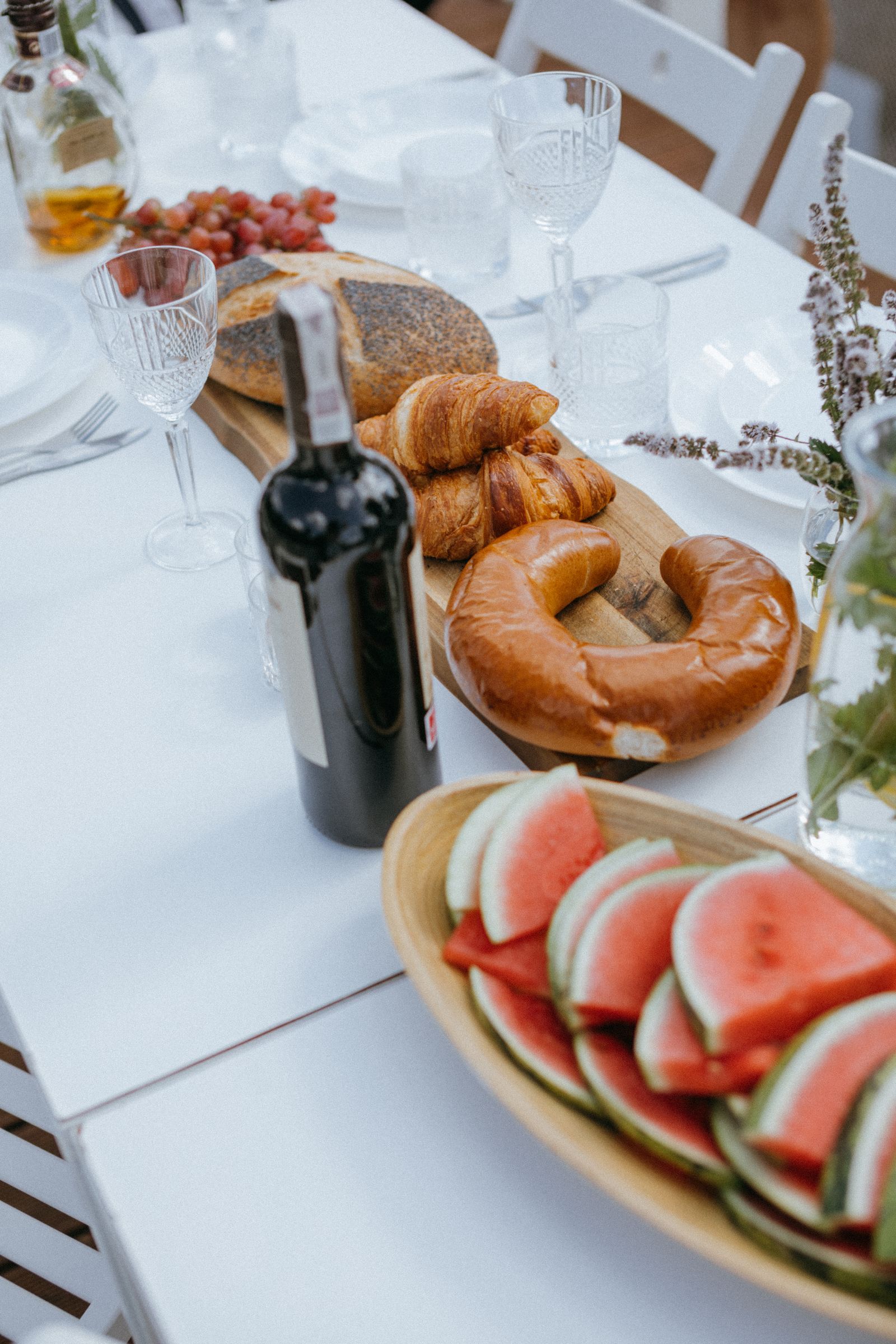 Dinner table set for a gathering on a sailing boat