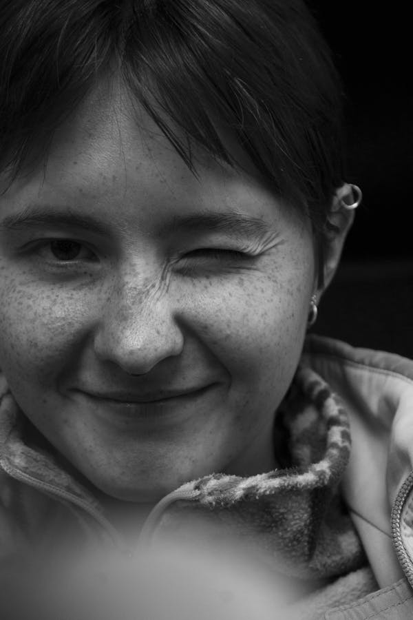 Grayscale Photo of a Woman