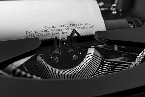 Grayscale Photo of a Typewritten Prayer