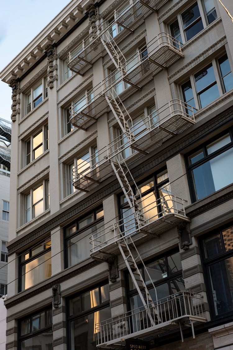 Apartment Building With Fire Escape Ladders