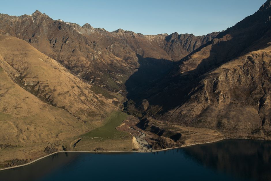 Amazing Half-Day Milford Helicopter Flight and Cruise from Queenstown Review Review 2026 - Stunning aerial view of the rugged mountains and serene water in Queenstown, New Zealand.