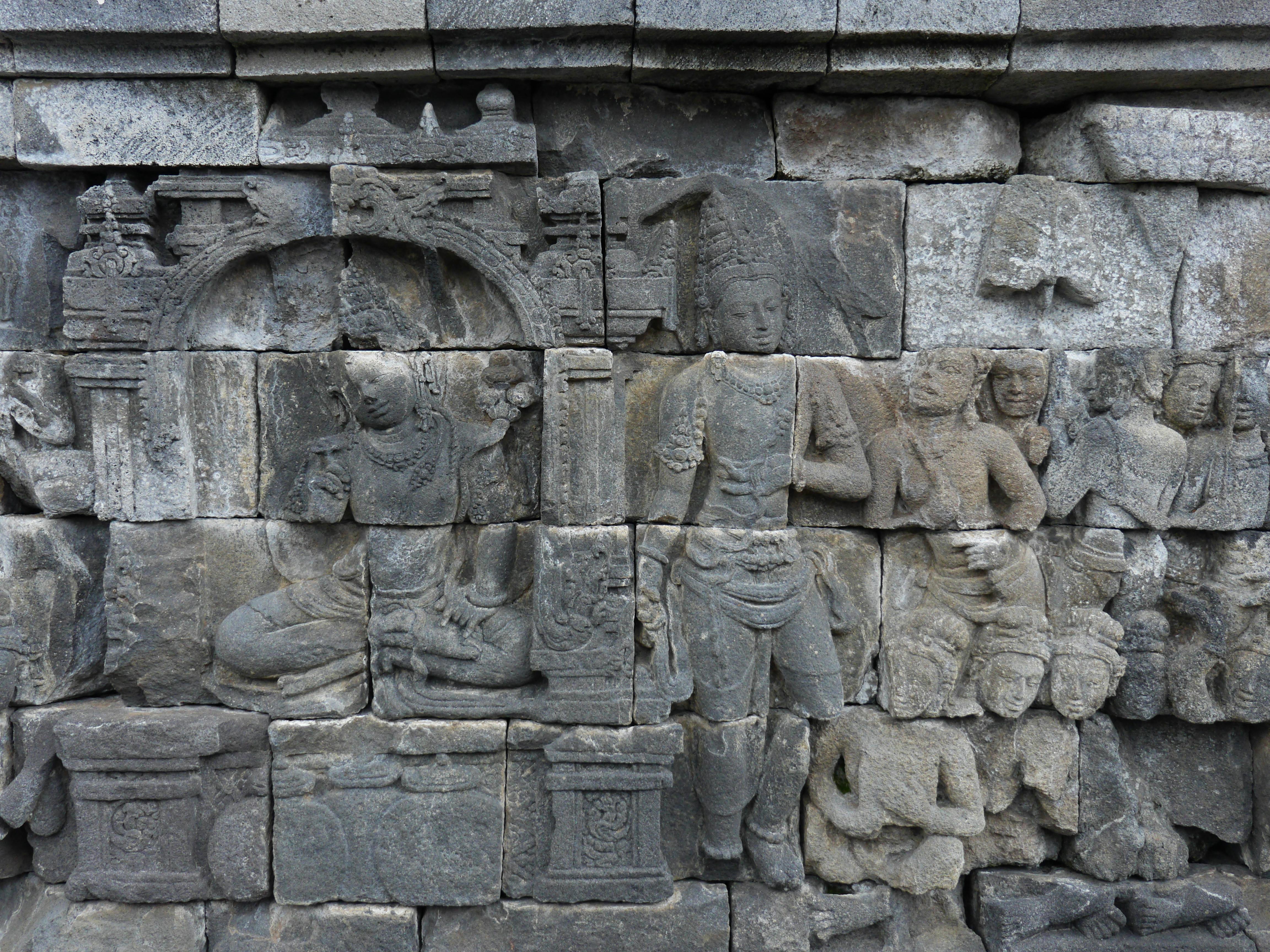 Brown and white lion’s mane mushrooms on a wooden board ready for use