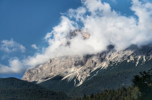 White Clouds Beside a Mountain