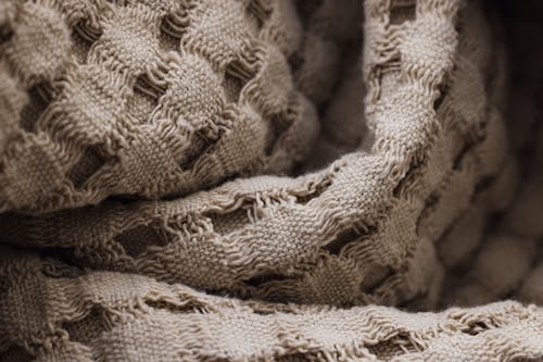 Close-Up Shot of a Brown Textile