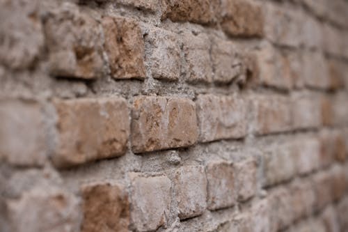 Close-Up Shot of a Brick Wall