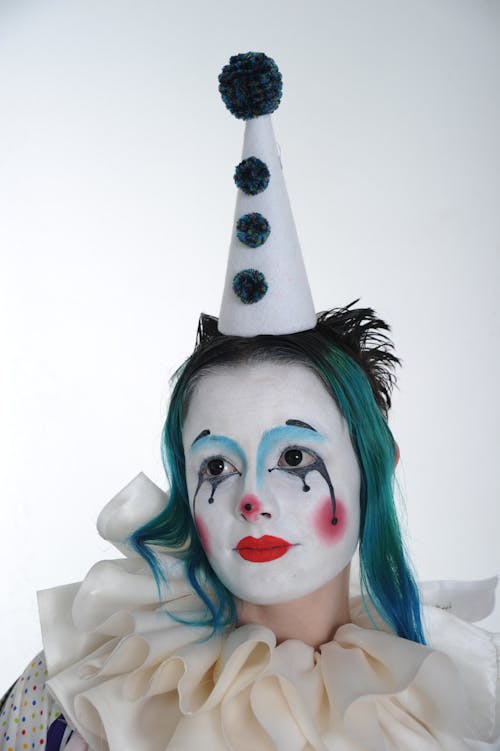 Clown Wearing a Party Hat