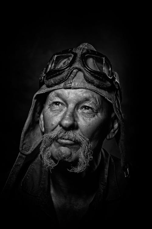 Man Wearing a Leather Helmet