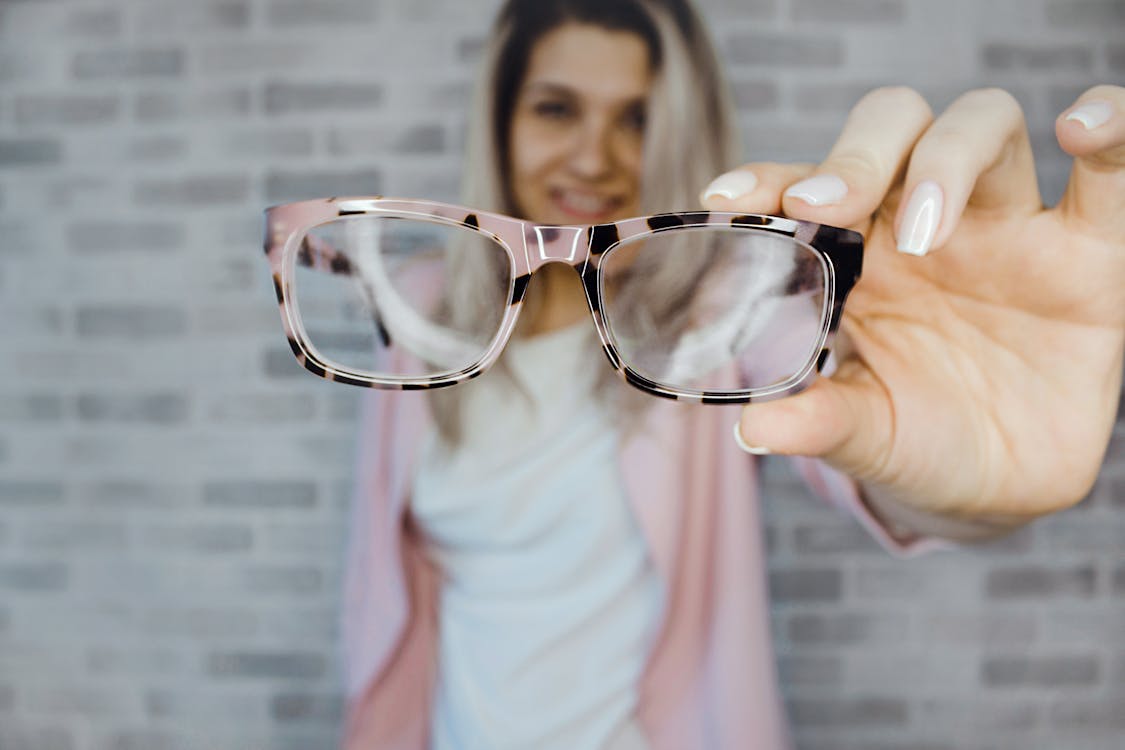 Free Selective Focus Photography of Pink and Black Framed Eyeglasses Stock Photo