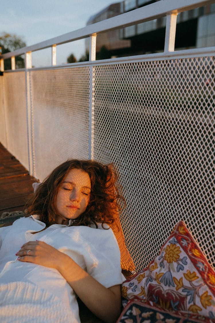 A Woman Sleeping In The Boat