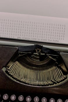 Vintage typewriter typing binary code with a quote about fact-checking.