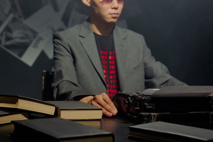 A Journalist Using A Typewriter