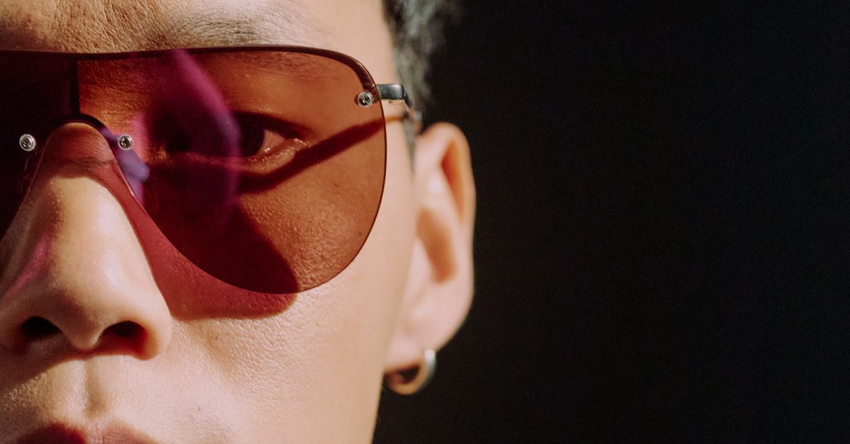 Spectacles Red Man Part of mans face in red eyeglasses sunlit by sunlight · Free Stock Photo