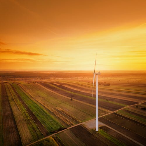 Aerial Photography of Windmill During Sunset