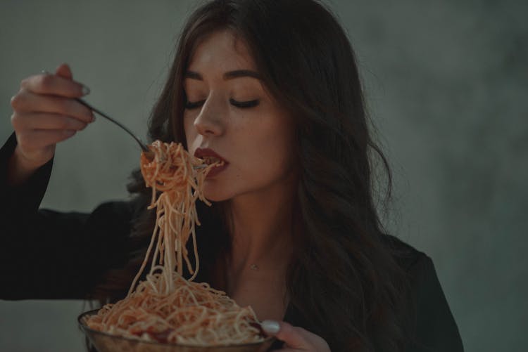 Woman Eating Spaghetti