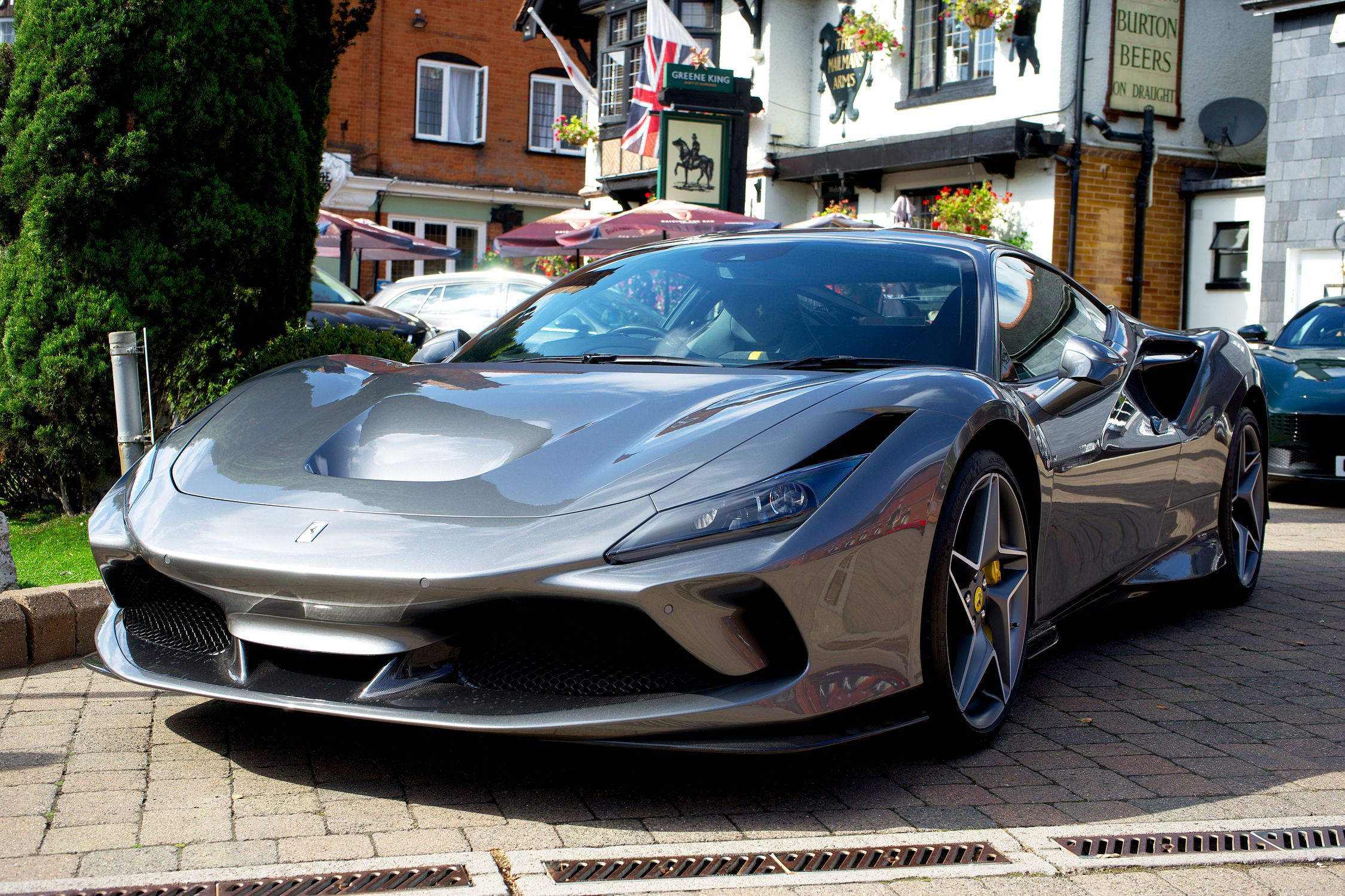 A Gray Ferrari Car Parked on Street · Free Stock Photo