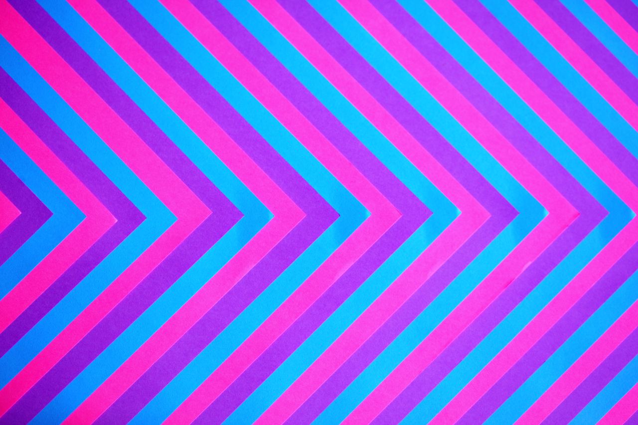 a vivid chevron pattern featuring bold pink and blue colors ideal for
