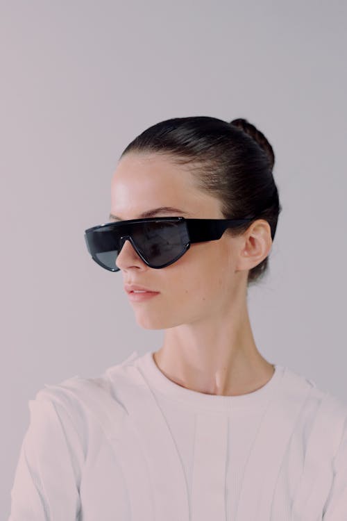 Studio shot of woman in sunglasses