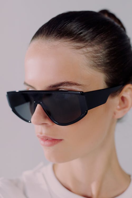 Studio shot of woman in sunglasses