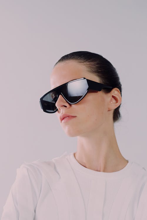 Studio shot of woman in sunglasses