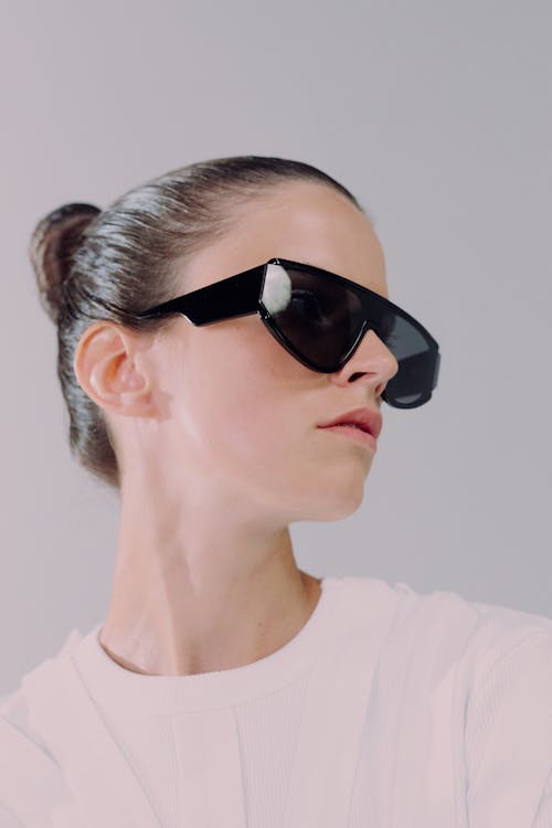 Studio shot of woman in sunglasses
