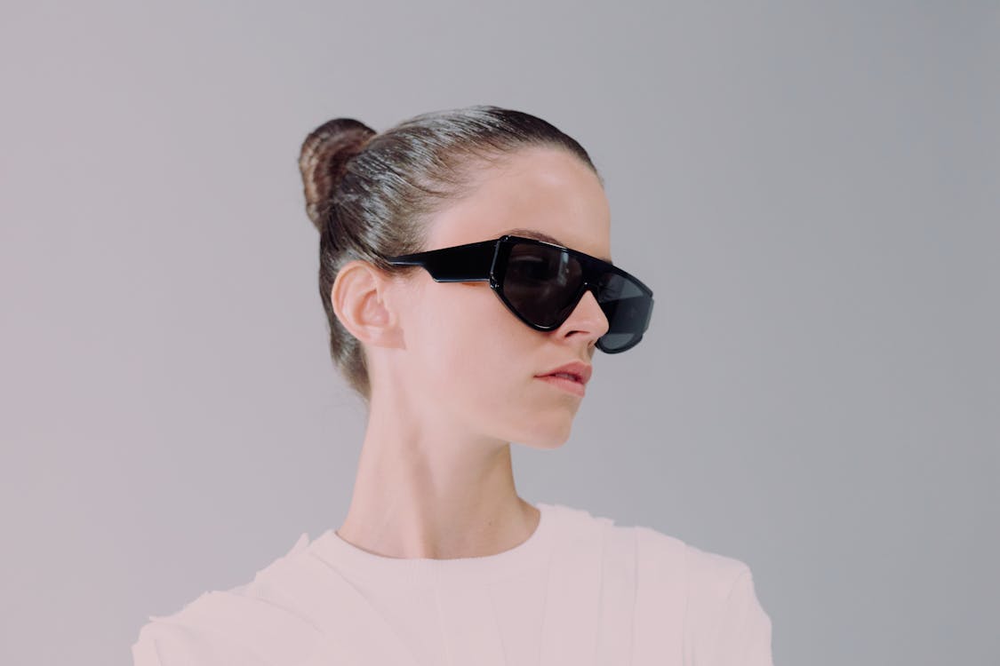 Studio shot of woman in sunglasses · Free Stock Photo