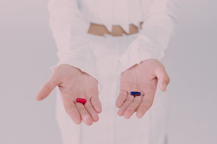 Woman Holding Pills