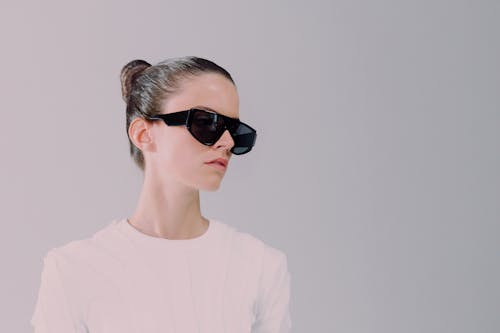 Studio shot of woman in sunglasses