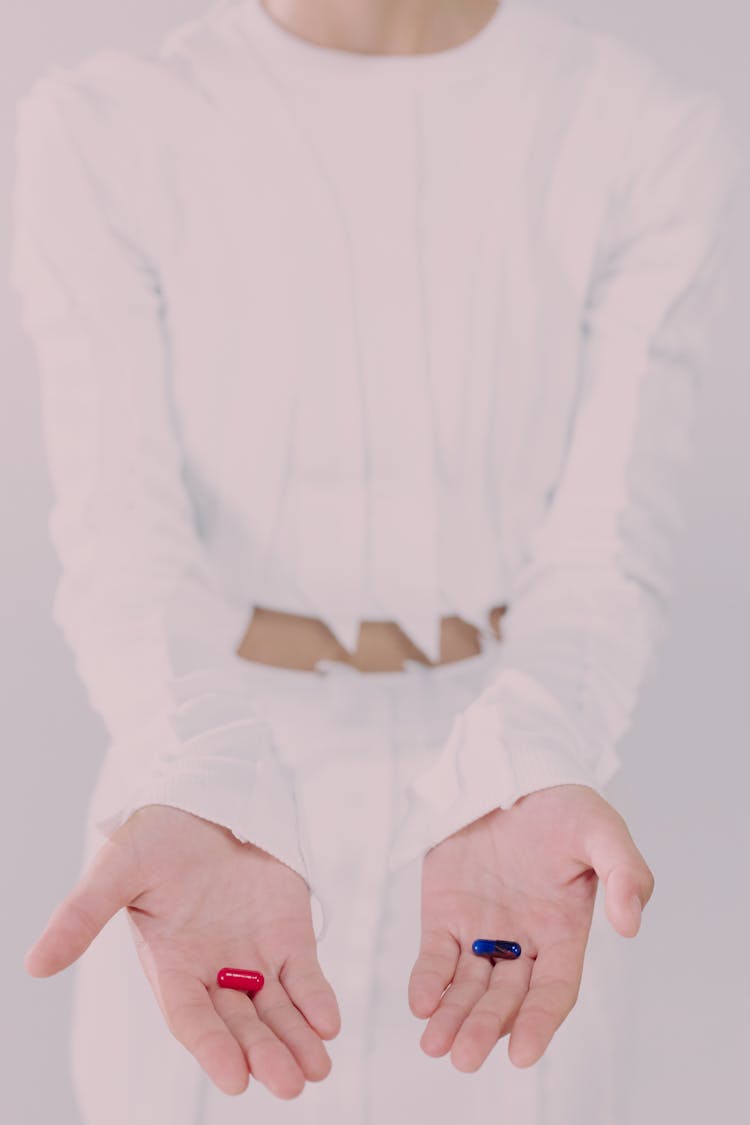 Woman Holding Pills