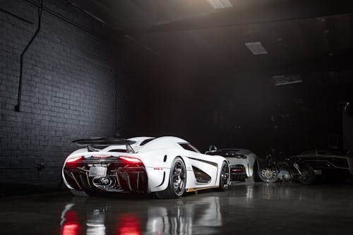 A White Sports Car Parked inside the Garage