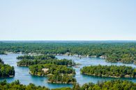 Islands with Green Trees on Body of Water