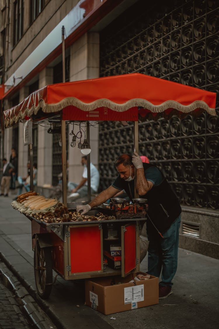 Street Vendor Selling Food 