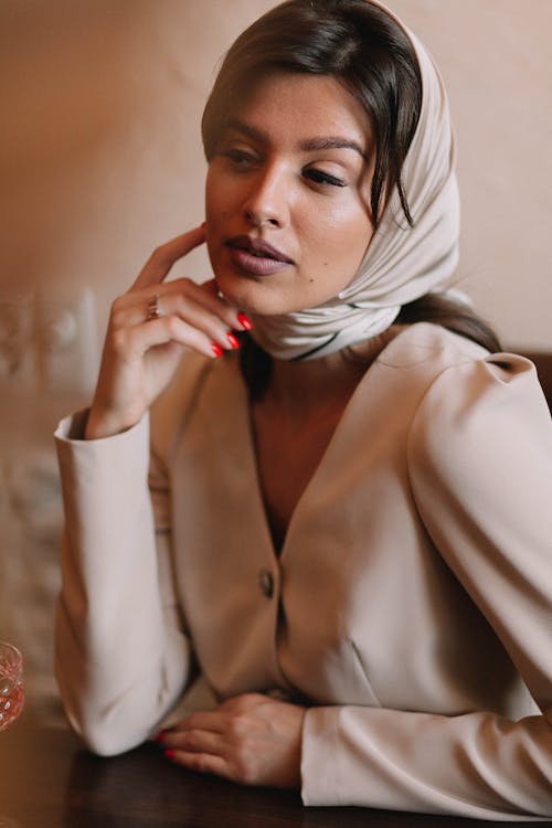 Free Woman in Beige Long Sleeve Top and Headscarf Stock Photo
