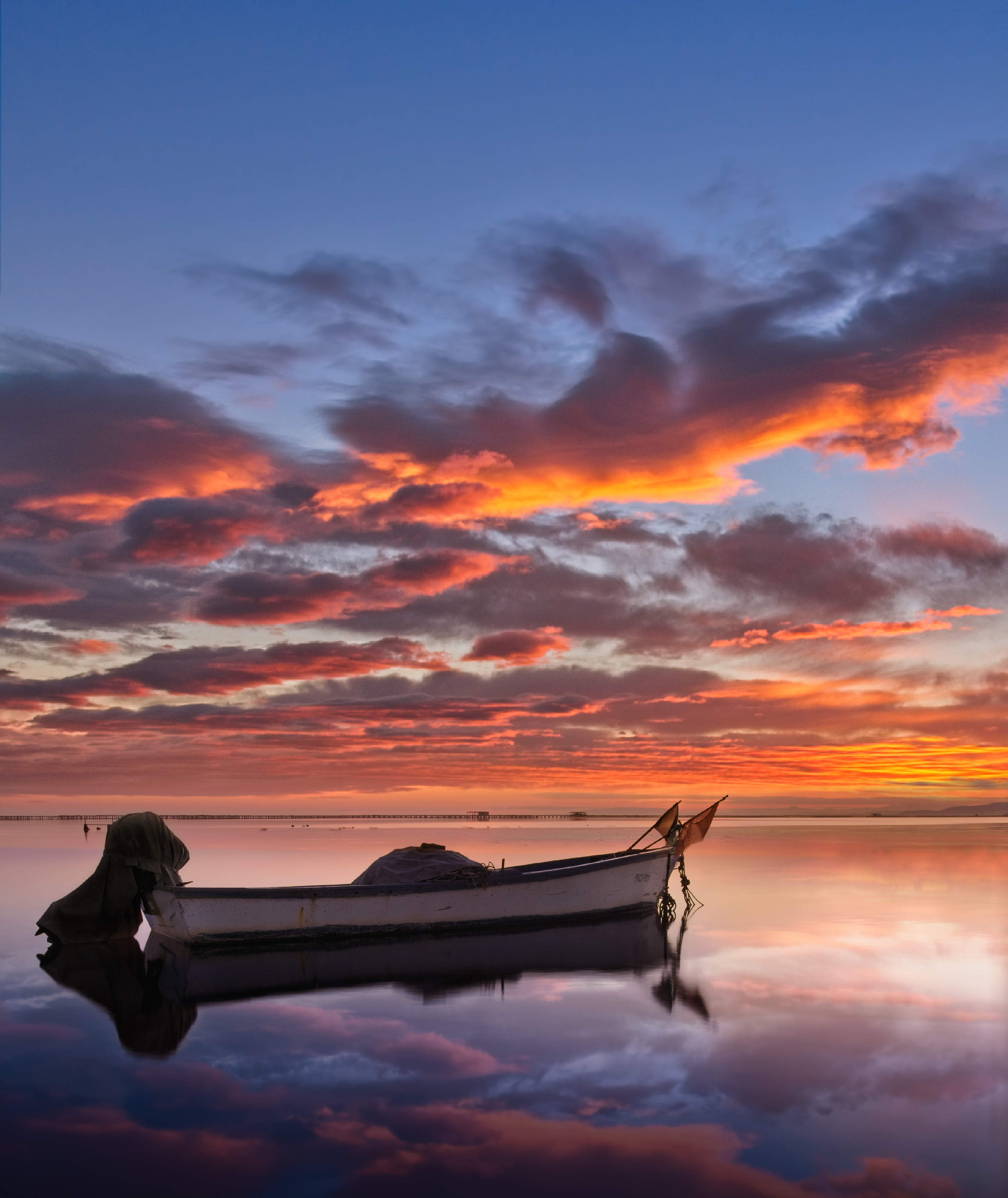 A Boat on the Sea during Sunset · Free Stock Photo