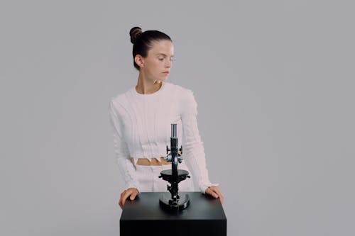 Woman standing at laboratory equipment