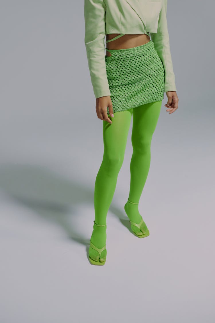 Low Section Of Woman In Green Clothing