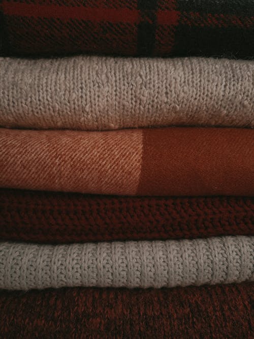 Close-Up Shot of a Stack of Fabrics