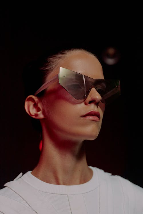 Portrait of woman in futuristic sunglasses · Free Stock Photo