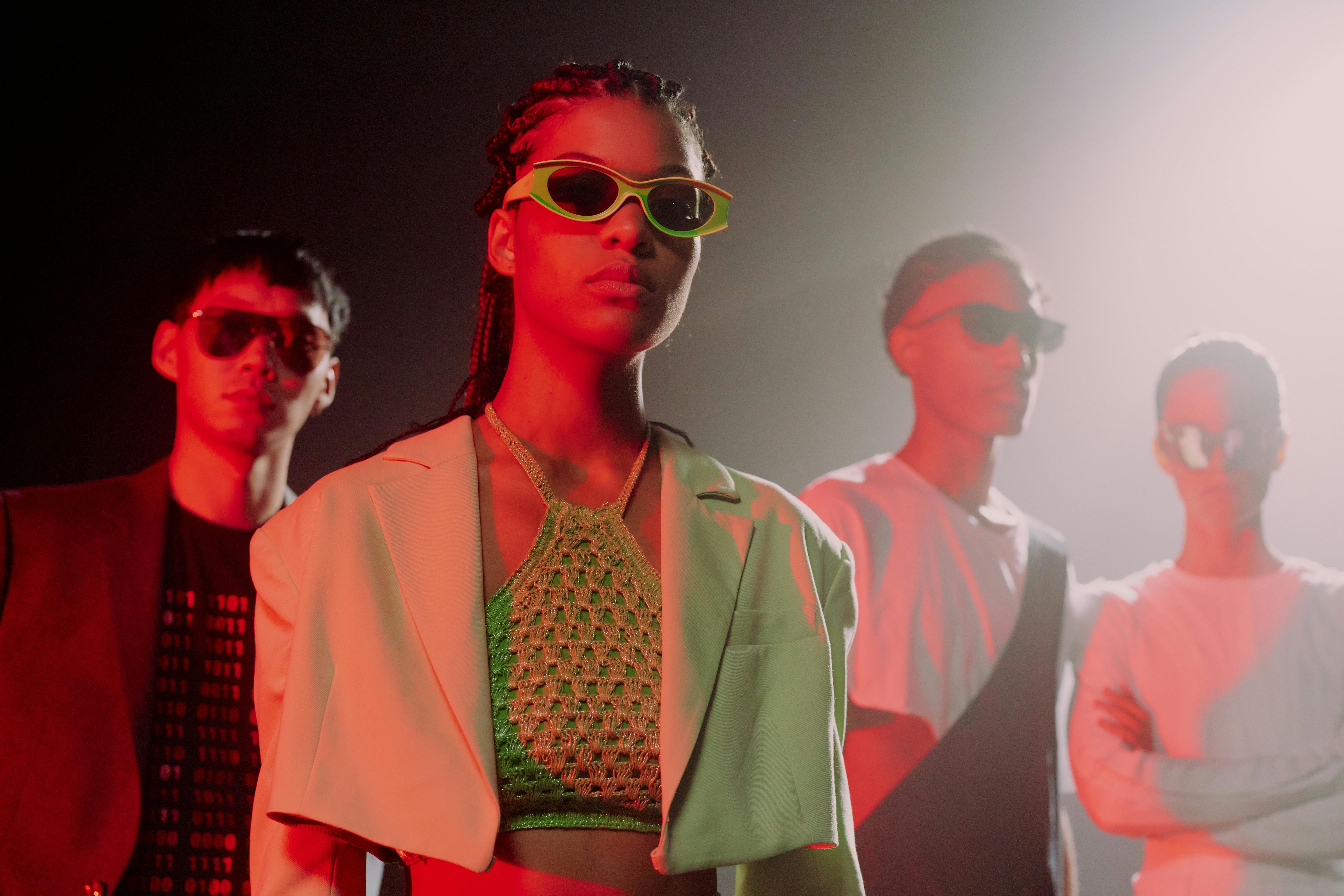 stylish young people wearing sunglasses