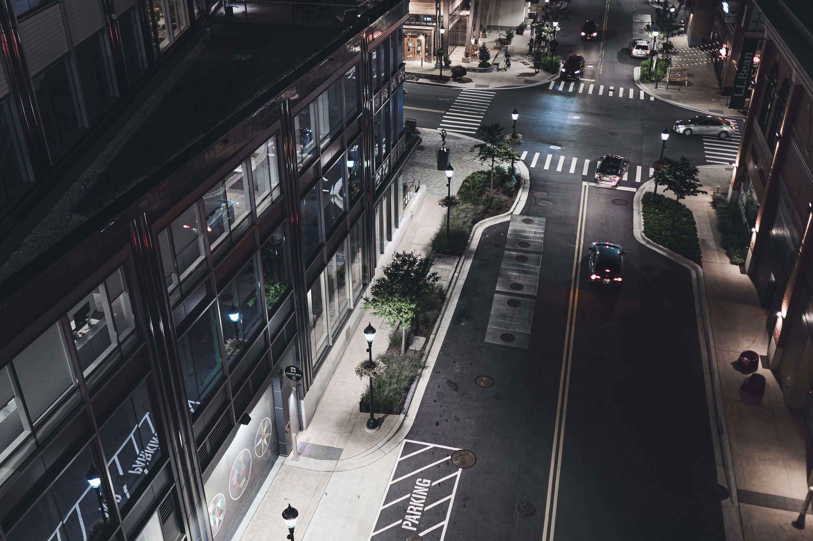 High Angle Shot of Cars on Road Near Buildings at Night · Free Stock Photo