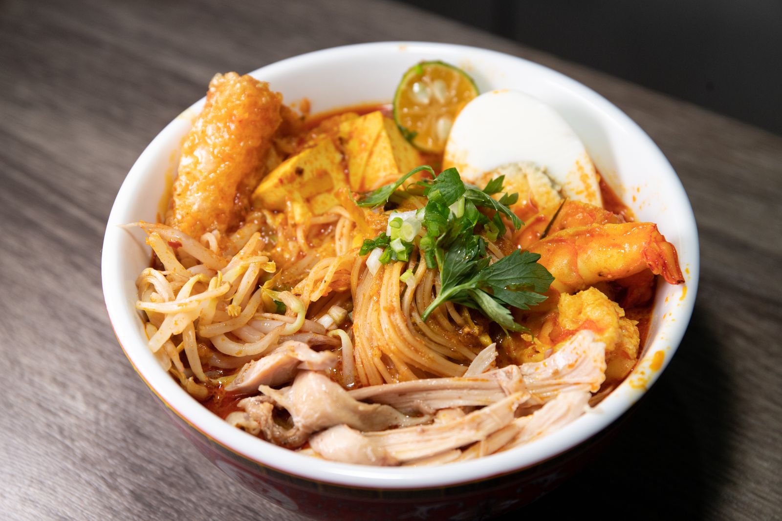 Close-up of Asian noodle soup in a white bowl