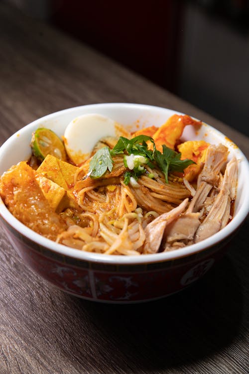 A Delicious Curry Laksa in White Bowl
