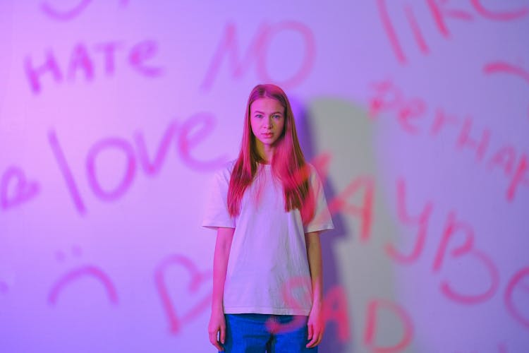 Portrait Of Girl Behind Glass With Words