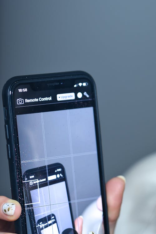 Close up of a Person Holding a Smart Phone