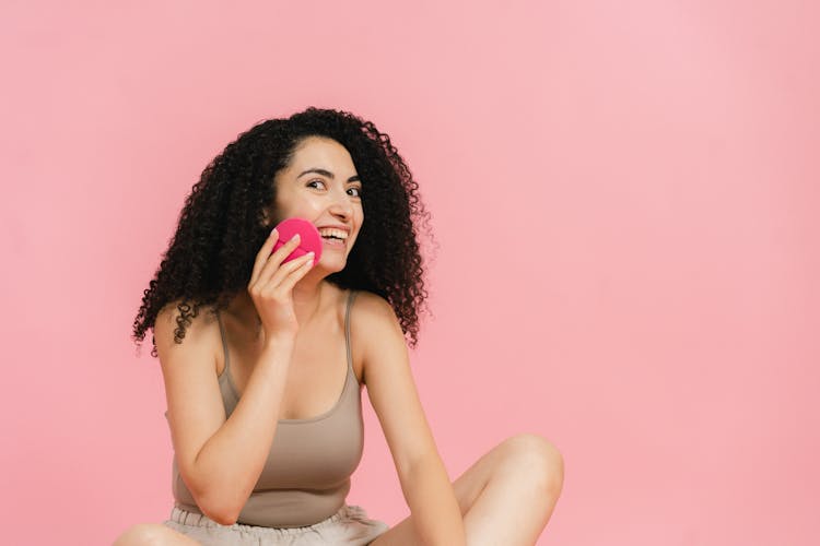 Woman Cleaning Her Face