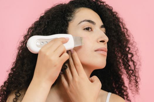 Woman Using a Cavitation Peeling Device