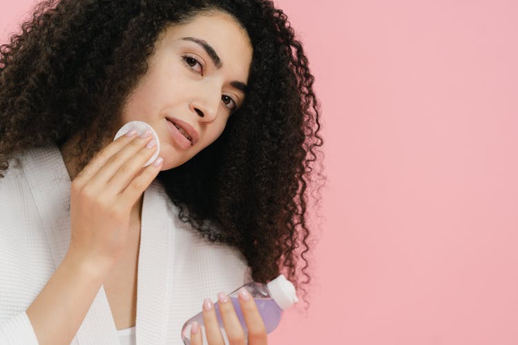 Woman Cleaning Her Face