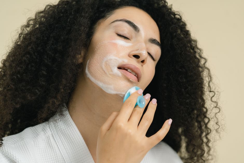 Soothing face cream texture being applied to skin - blemish care face cream Soothing face cream texture being applied to skin - blemish care face cream