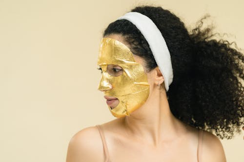 Kostenloses Stock Foto zu gesichtsmaske, gold, kosmetik-produkt