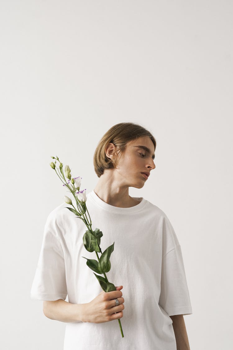 Young Man Holding Flowers 