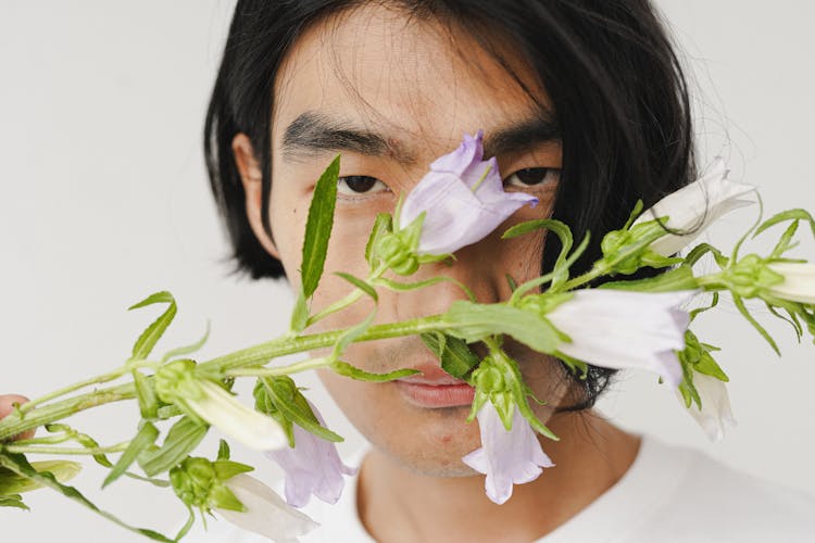 Man Holding Flowers